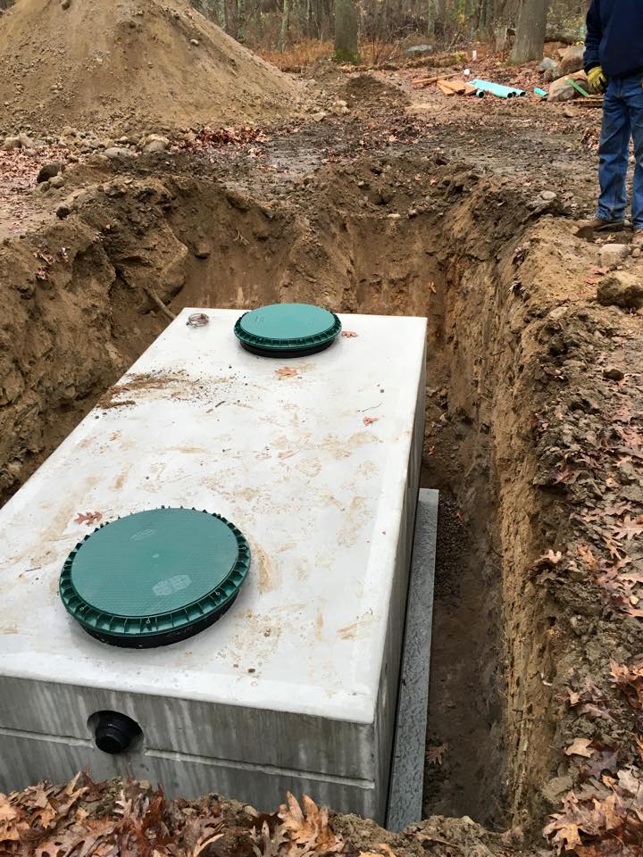 Grenco Excavation installs a new septic tank.